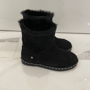Authentic Chanel suede ankle boots in black with silver hardware